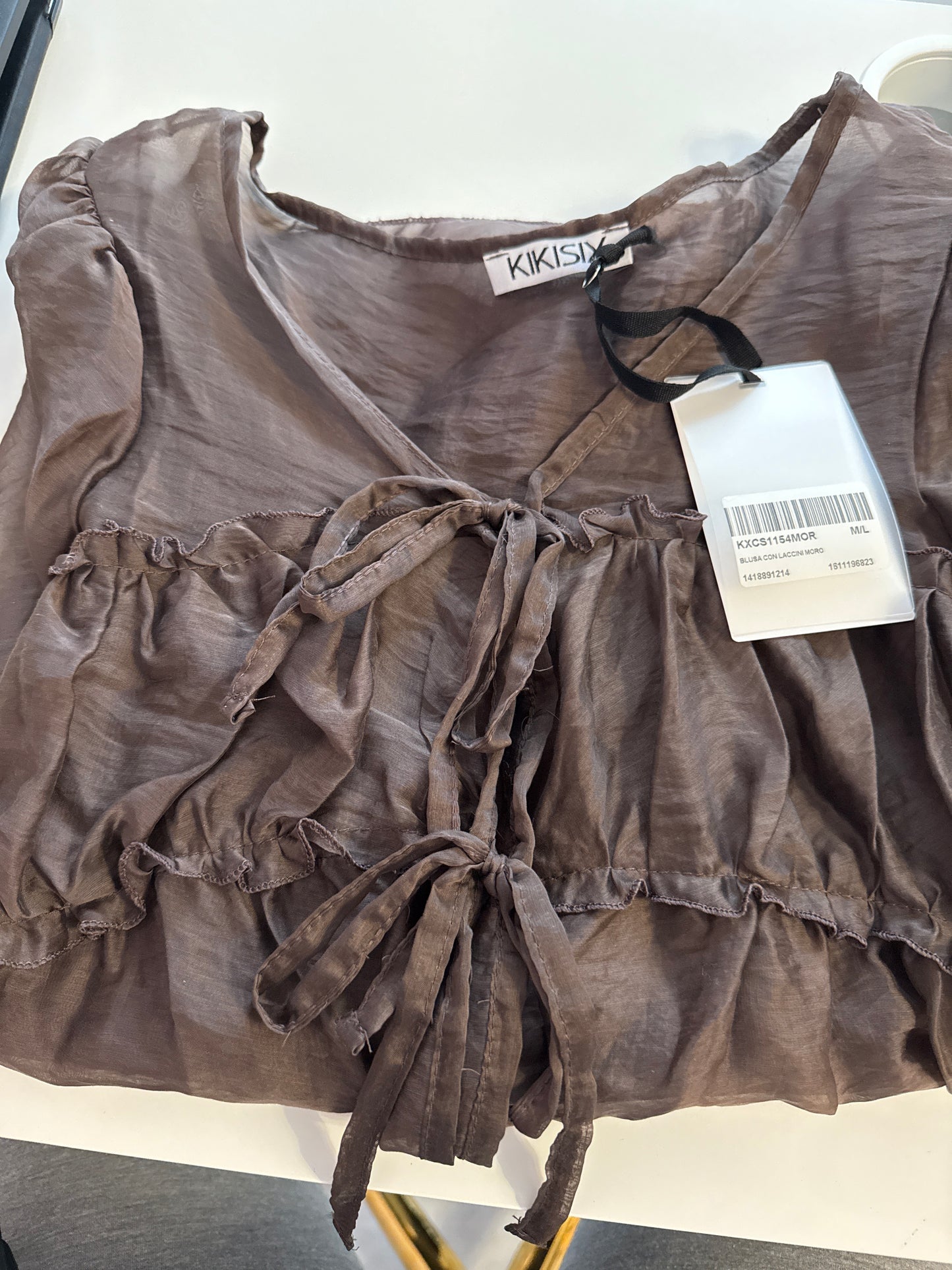 Blusa con laccini