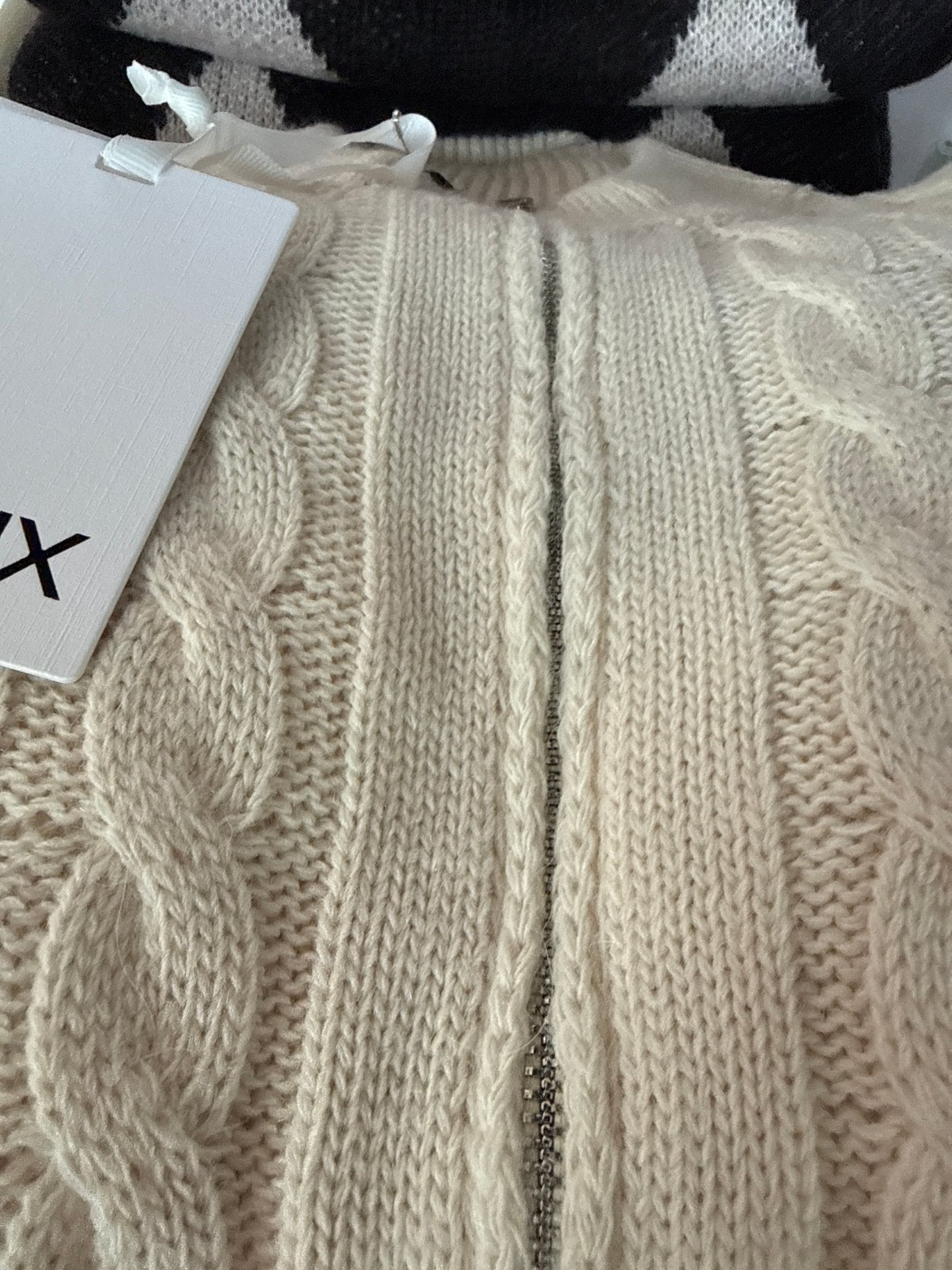 Maglia con zip e treccia