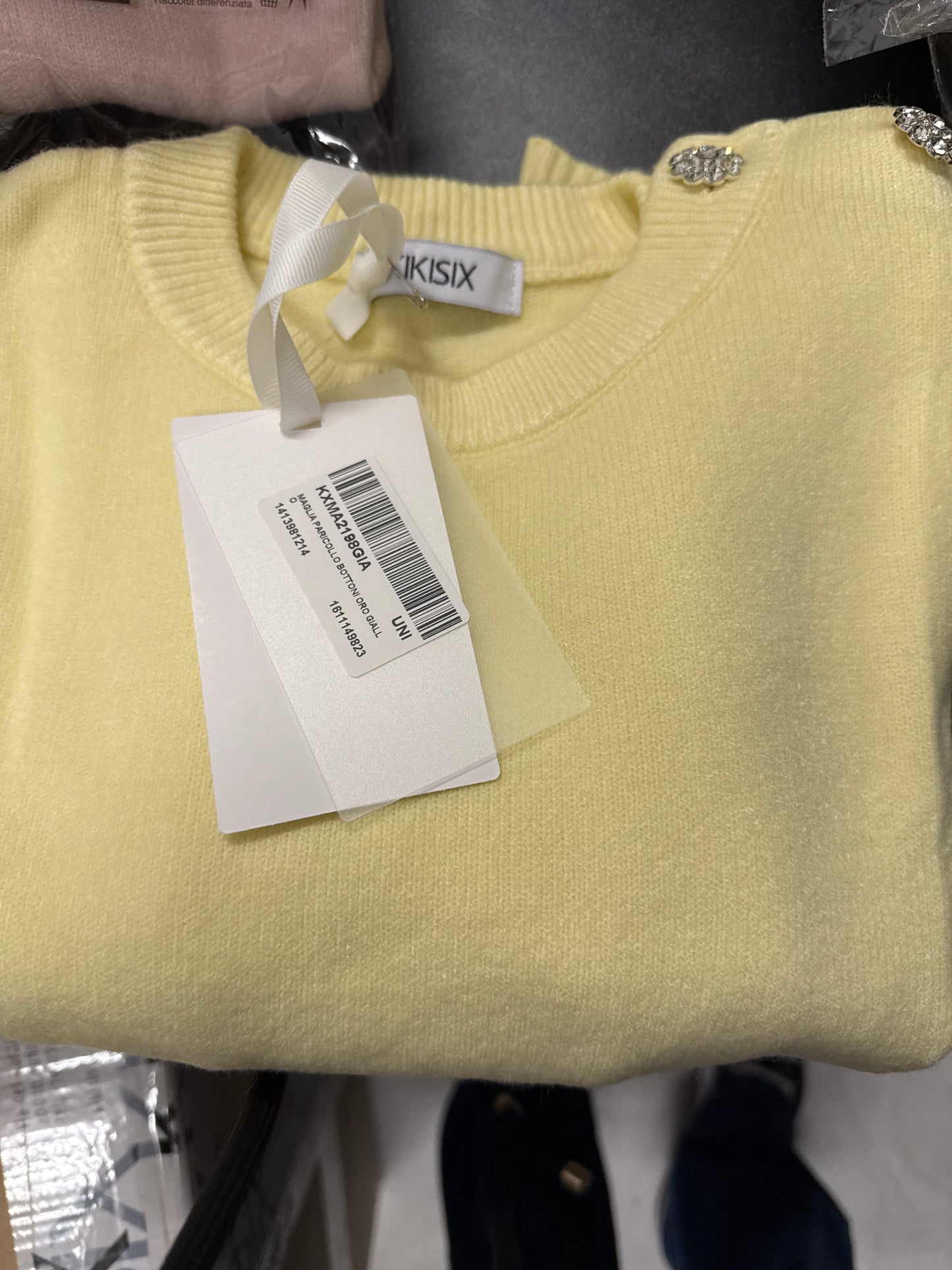 Maglia paricollo bottoni