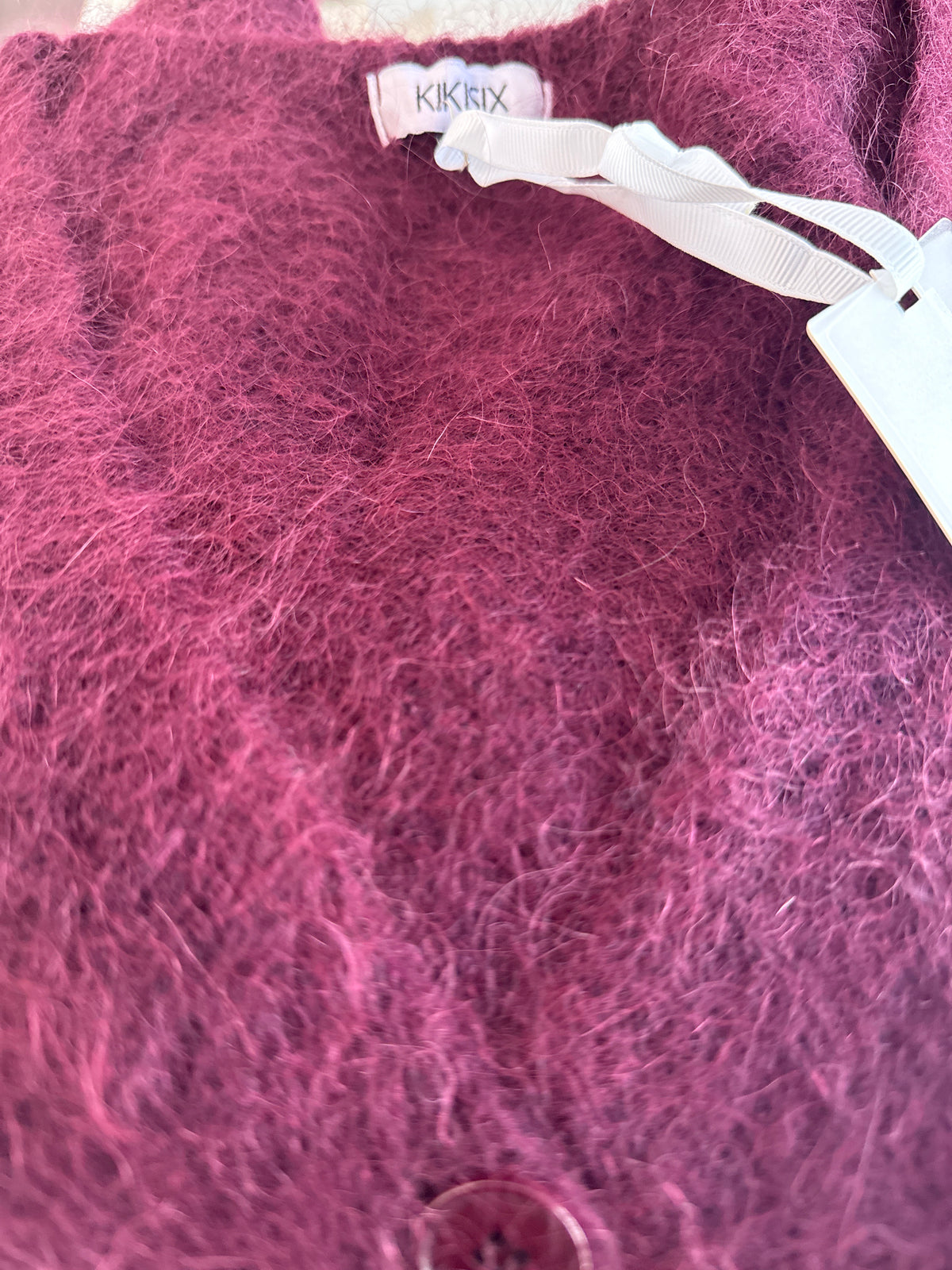 Gilet scollo v con bottoni in mohair